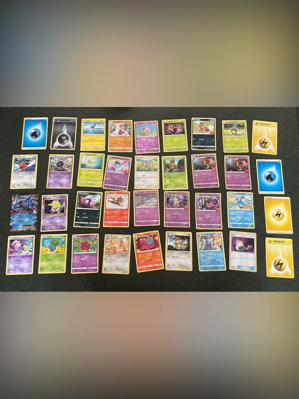 Pokemon Trading Cards Assortment - Purple, Yellow, Green, Blue- Lot of 67 cards